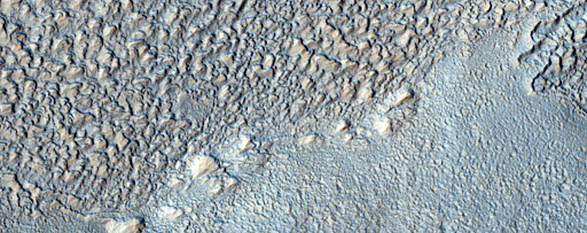 Layered Deposits in Crater in Hellas Montes
