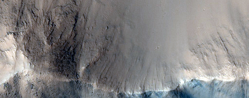 Crater Ejecta Spilling onto Floor of Another Crater

