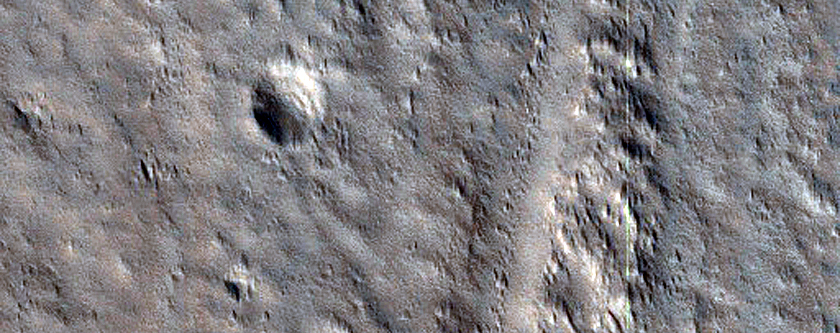 Channels with Streamlined Forms in Acheron Fossae
