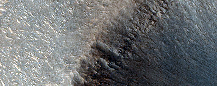 Impact Crater on Northern Plains
