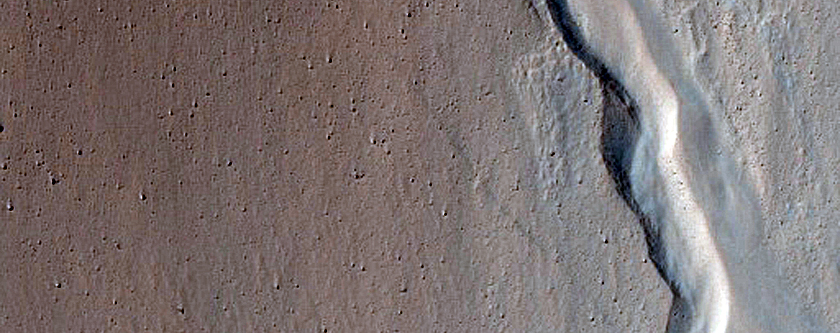 Gullies and Mounds in Tombe Crater 