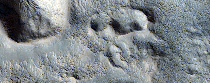 Channel Near Crater in Northern Mid-Latitudes