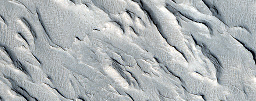 Layers Exposed along a Mesa Wall in Aeolis Region
