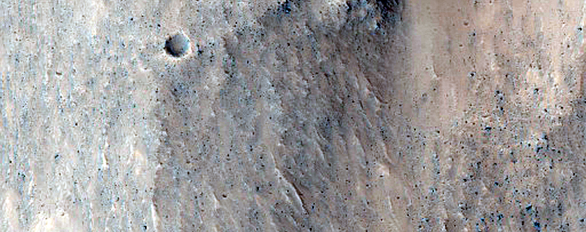 Juventae Chasma Wall Rock and Channel and Fan Features
