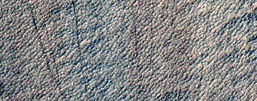 Scalloped Terrain in Mid-Latitude Mantle at Peneus Patera
