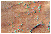 Sand Sheet Characterization near Meroe Patera
