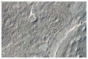 Variae geologicae conformationes inter se tangentes in Aeolide Dorsa