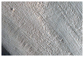 זרימת קרחונים בהרי שולחן פרוטונילוס מנסאי (Protonilus Mensae)