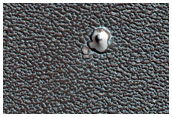Small Ice-Filled North Polar Layered Deposits Crater

