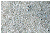 מפולת מעניינת על קיר של הר שולחן בהרי שולחן פרוטונילוס מנסאי (Protonilus Mensae)