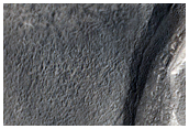 Exit Breach in Well-Preserved Crater
