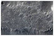 Flow Terminus and Scoured Terrain in Elysium Planitia Region

