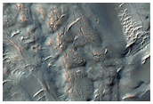 Flow-Like Mound in Equatorial Crater
