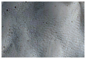 Pitted Material of Impact Crater in Tempe Terra
