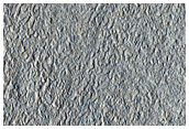 Albedo Change on Debris Apron in Tempe Terra
