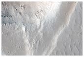 Line of Pits in Ceraunius Fossae
