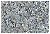 Topography and Geomorphology of Surface and Contacts in Astapus Colles
