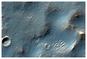 Lobate Form Adjacent to Crater Wall
