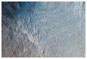 Small Well-Preserved and Potentially Gullied Crater in Idaeus Fossae
