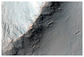 Dark Slopes of Coprates Region Ridge
