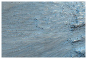 Light-Toned Deposits along Upper Floor of Hydrae Chasma
