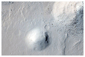 Stair-Stepped Landforms in East Pasteur Crater
