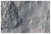 Layers on Rim of Crater North of Antoniadi Crater
