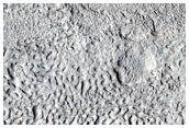 Glacial-Like Flow on Mound in Protonilus Mensae Region

