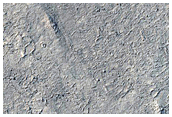 Rootless Cones and Transition to Medusae Fossae Formation
