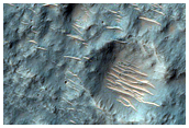 Peraea Cavus Sinuous Ridge and Bright Deposit