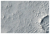 Arcuate Depression Associated with Crater Erosion
