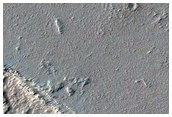Fracture on Plains Southeast of Ascraeus Mons and North of Noctis Fossae