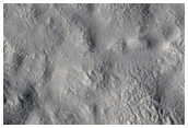 Unusual Crater Deposit in Northern Mid-Latitude Crater
