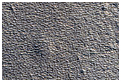 Scarp in Mantle Material in Milankovic Crater
