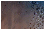 Monitor Steep Crater Slope in Isidis Planitia
