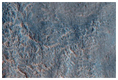 Crater and Pits in Northern Mid-Latitudes