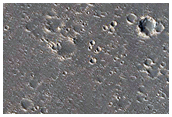 Troughs Going Around Mesa in Hephaestus Fossae
