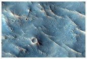 Crater in Inner Channel of Zarqa Valles