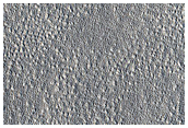 Possible Large Ice Unit Intersecting Degraded Crater
