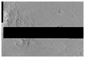 Secondary Craters from Fresh 1-Kilometer Diameter Crater to North
