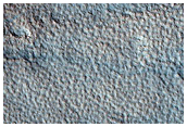Small Conical Features on Northern Plains
