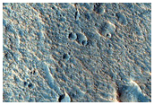 Small Craters in Tail of Streamlined Island
