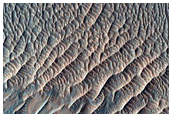 Light-Toned Brecciated Materials along Mesa in Melas Chasma
