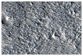 Layered Features in Depression in Galaxias Fossae Region
