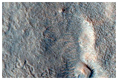 Dipping Layers in Depressions in Deuteronilus Mensae
