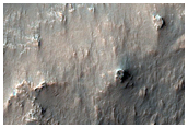 Mound with Gullies and Channels in Northern Hellas Planitia
