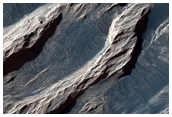 Formation Dubbed White Rock on Floor of Pollack Crater 
