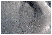 Exit Breach in Impact Crater
