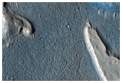 Light and Dark-Toned Landforms in Maja Valles
