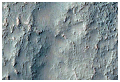 Transition from Inverted to Depressed Channel in Terra Sirenum